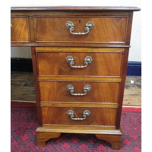 150 - Edwardian mahogany pedestal desk with leatherette inset, 8 frieze drawers, 6 side drawers, ornate br... 