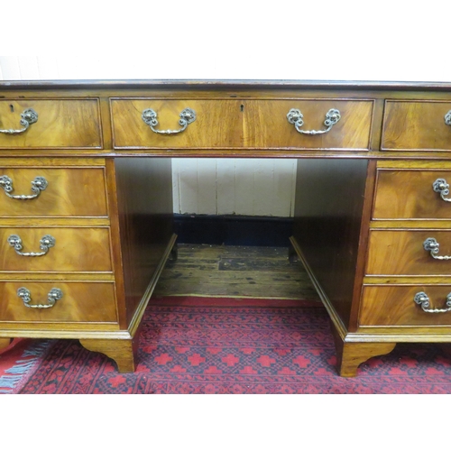 150 - Edwardian mahogany pedestal desk with leatherette inset, 8 frieze drawers, 6 side drawers, ornate br... 