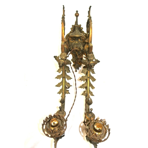 172 - Pair of vintage bronze wall lights, with folding shaped arms, finials, foliate decoration & scroll b... 