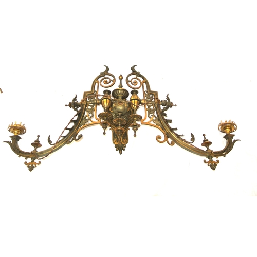 172 - Pair of vintage bronze wall lights, with folding shaped arms, finials, foliate decoration & scroll b... 