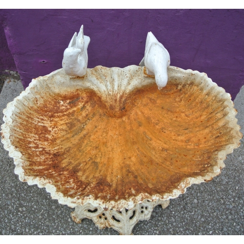 206 - Ornate cast iron birdbath with shell shaped bowl, bird decoration & pierced base