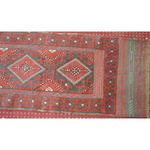 217 - Two full pile Afghan Meshkin tribal runners with diamond pattern, each 260cm x 57cm