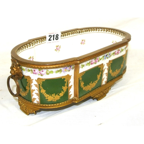 218 - Oval Sevres jardiniere with ornate & embossed gilt & foliate decoration, ormolu borders, shaped legs... 