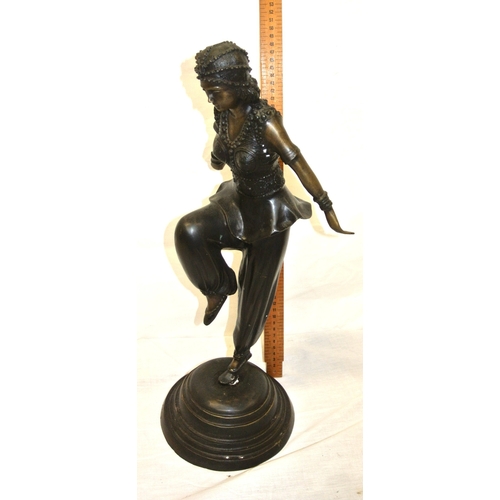 227 - French Art Deco bronzed figure of an Asian dancing girl in costume, on round stepped base