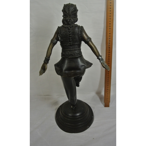 227 - French Art Deco bronzed figure of an Asian dancing girl in costume, on round stepped base