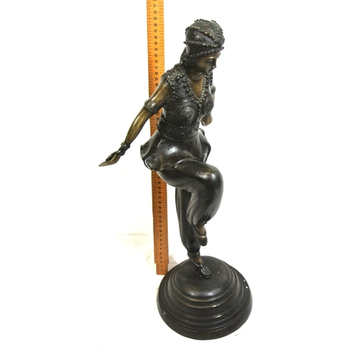 227 - French Art Deco bronzed figure of an Asian dancing girl in costume, on round stepped base