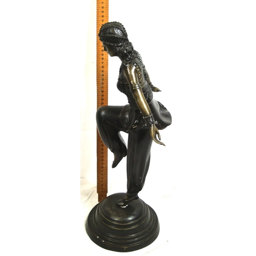 227 - French Art Deco bronzed figure of an Asian dancing girl in costume, on round stepped base