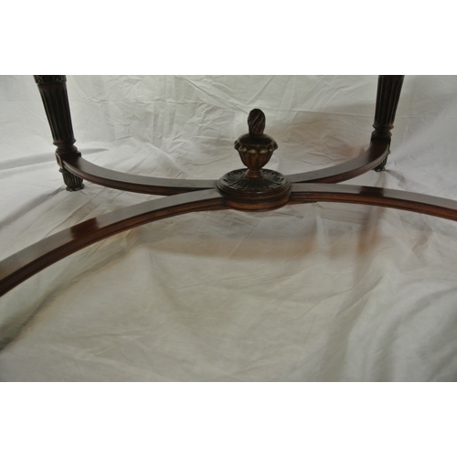 60 - French style oval coffee or occasional table with serpentine borders, reeded frieze and legs with sh... 