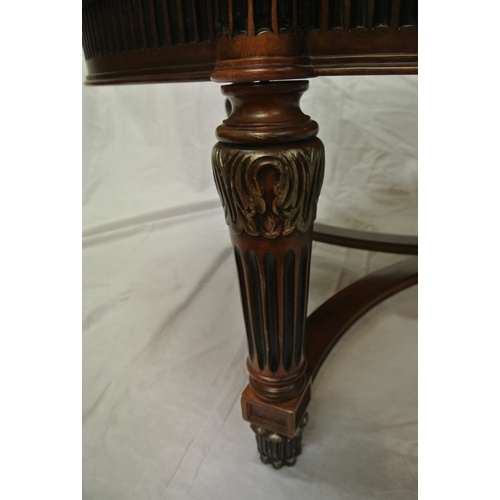 60 - French style oval coffee or occasional table with serpentine borders, reeded frieze and legs with sh... 