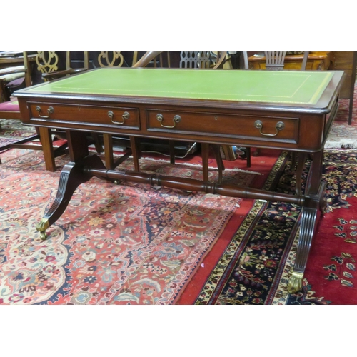 75 - Edwardian design oblong desk with leatherette inset, two drawers with drop handles, shaped columns &... 