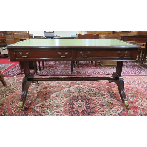 75 - Edwardian design oblong desk with leatherette inset, two drawers with drop handles, shaped columns &... 