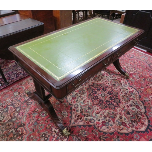 75 - Edwardian design oblong desk with leatherette inset, two drawers with drop handles, shaped columns &... 