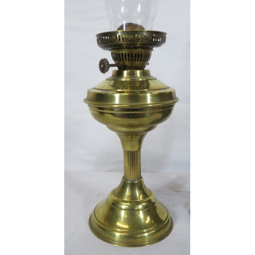 78 - 2 Victorian brass table oil lamps with glass chimneys