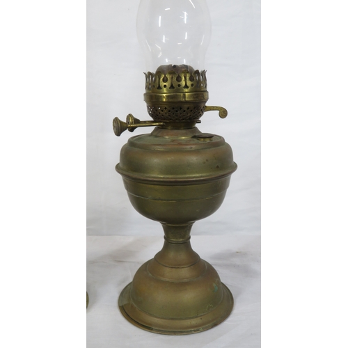 78 - 2 Victorian brass table oil lamps with glass chimneys