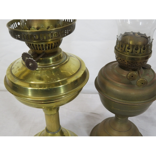 78 - 2 Victorian brass table oil lamps with glass chimneys