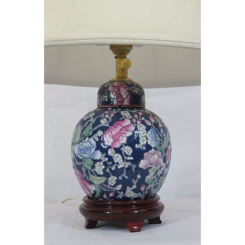 88 - Oriental style porcelain electric lamp with foliate decoration & timber base