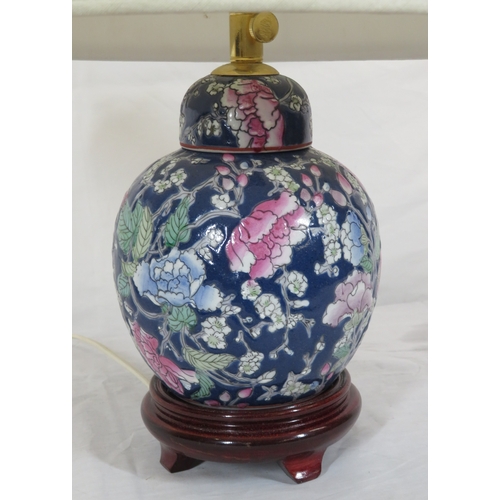 88 - Oriental style porcelain electric lamp with foliate decoration & timber base