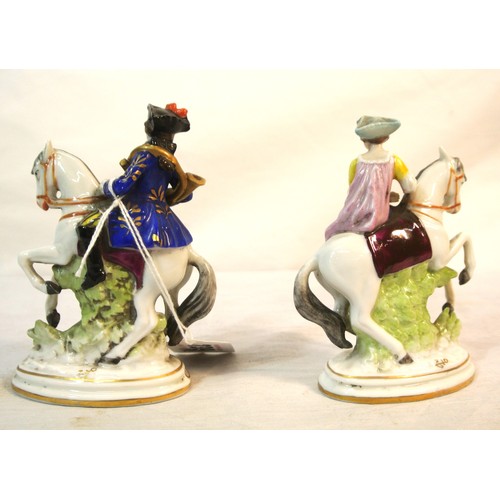 239 - Pair of Chelsea figures of figures on horseback, on oval decorated bases