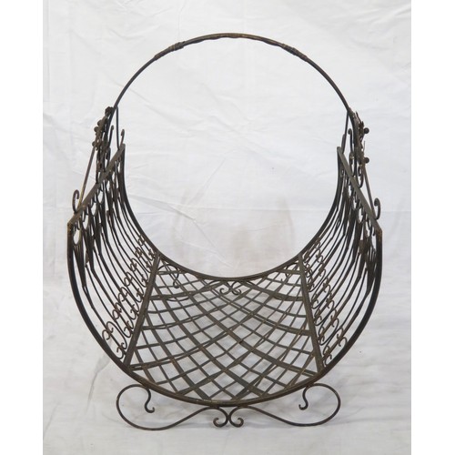 268 - Victorian style wrought iron log basket with shaped handle