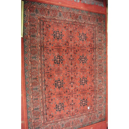 186 - Terracotta ground full wool pile Afghan design rug with floral pattern 340 x250 cm