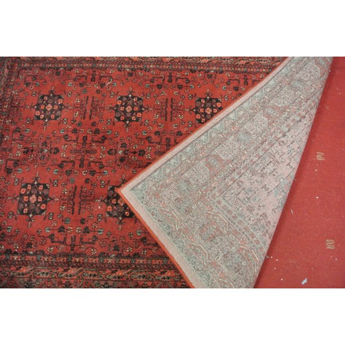 186 - Terracotta ground full wool pile Afghan design rug with floral pattern 340 x250 cm