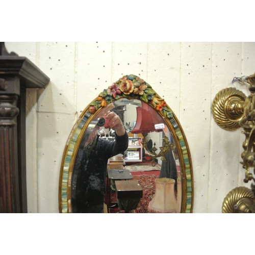 192 - Ornate Dresden style oval bevelled glass wall mirror with ornate foliate decorated porcelain frame