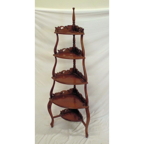 181 - Victorian mahogany bow fronted four tier whatnot with turned finials, foliate carving, on cabriole l... 