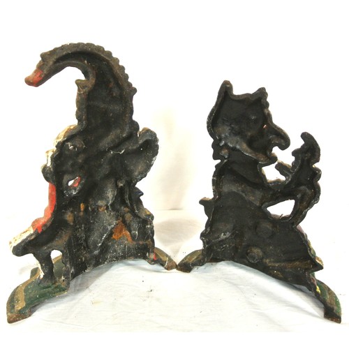 199 - Vintage Punch & Judy metal door stops with shaped bases