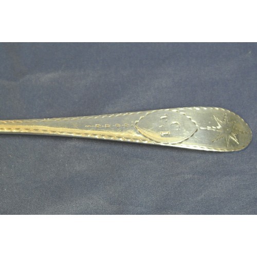 111 - Irish Silver serving spoon with bright cut crested pointed handle, by Michael Keating, Dublin 1795, ... 