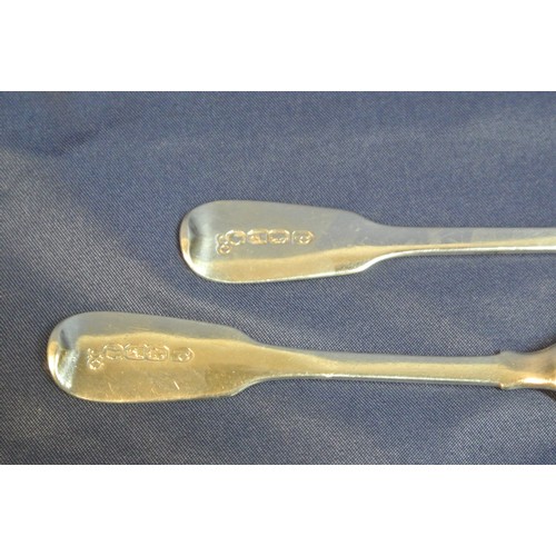 94 - Pair of Irish silver mustard or egg spoons with fiddle pattern crested handles and oval bowls, by Ch... 