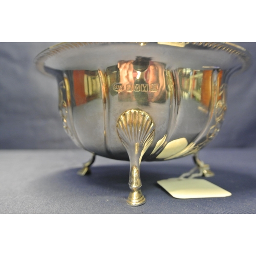 100 - Irish silver sugar bowl with reeded rim, embossed with frit and wavy reeding, shell knuckles and ste... 