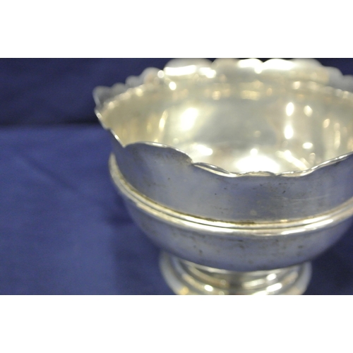 101 - Irish silver bowl with wavy rim, central band, on roiund raised base, by Royal Irish Silver, Dublin ... 