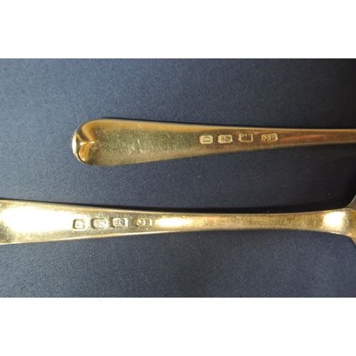 104 - Pair of Irish silver teaspoons with crested handles by John Bolland, Dublin 1800, 55g, 17cm