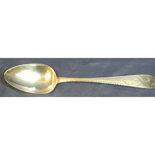 111 - Irish Silver serving spoon with bright cut crested pointed handle, by Michael Keating, Dublin 1795, ... 