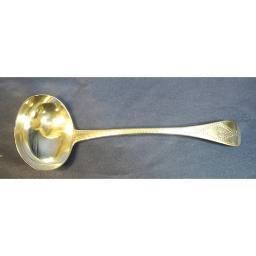 112 - Irish silver sauce ladle with bright cut shaped crested handle and oval bowl, by Robert W Smith, Dub... 