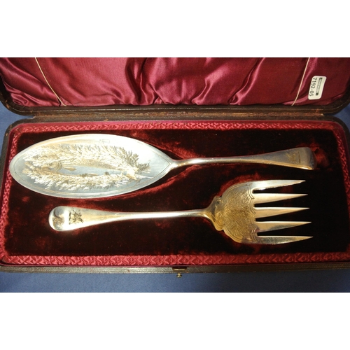 19 - Pair of silverplated fish servers, ornately decorated, in presentation case