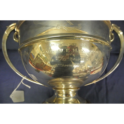 40 - Large London silver trophy cup with shaped handles, on round  spreading base, dated 1923, 684g, 20cm... 