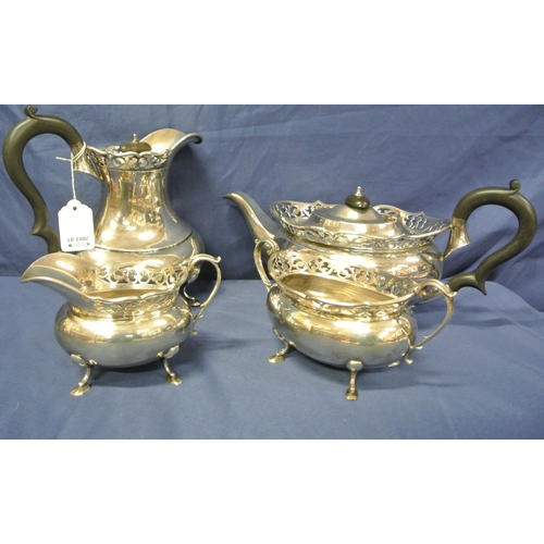 44 - Four piece Birmingham silver tea service of oval baluster form with pierced rims, shaped handles, on... 