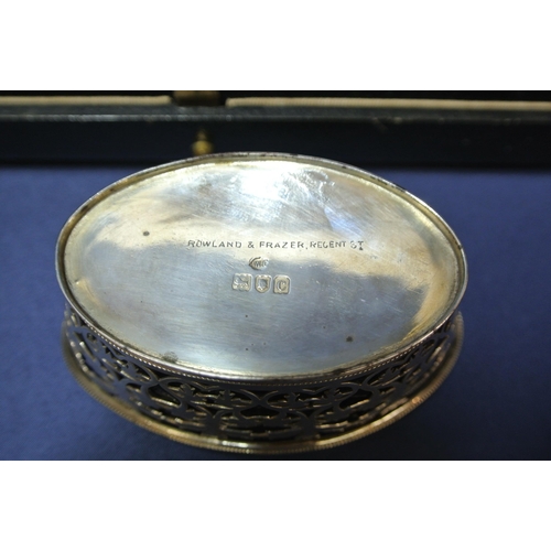 48 - Pair of London silver oval salts with pierced angular sides, reeded rims and blue glass liners, in p... 