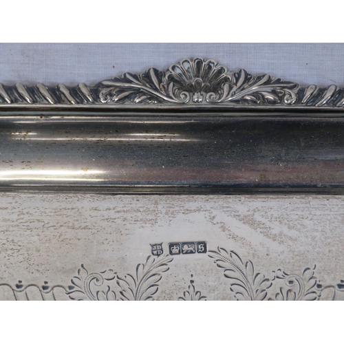 99 - Large George V Sheffield silver serving tray with shell and gadroon borders, shaped handles, foliate... 