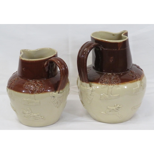 267 - Pair of Victorian style earthenware ewers with figured & foliate decoration