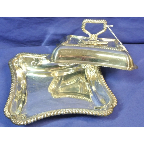 22 - Small silverplated entree dish with concave gadroon borders and detachable handle