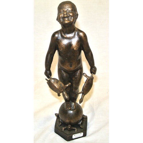 209 - Ornate bronzed ornament of a boy with turtles on hexagonal base