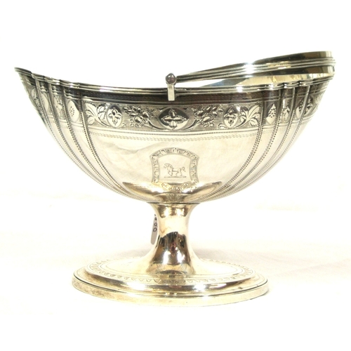 150 - Irish silver swing handled sugar basket with reeded swing handle, reeded rim, foliate decoration and... 