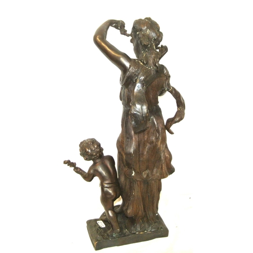 204 - Ornate allegorical bronzed figure of a lady and child, on shaped base H 48 cm Base 18 x12 cm