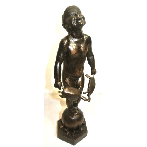 209 - Ornate bronzed ornament of a boy with turtles on hexagonal base