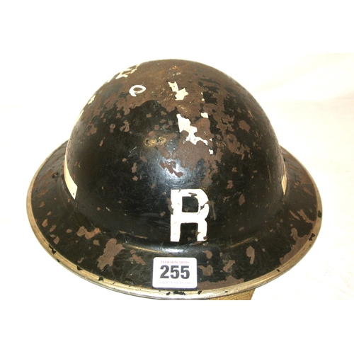 255 - Brody Helment with leather liner and chin strap covered in dark paint with the letter R, named to B ... 