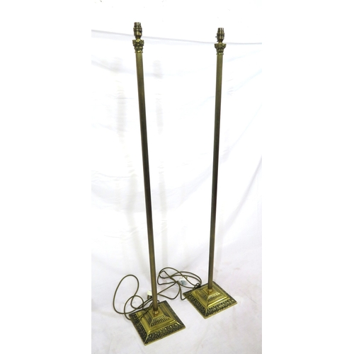 292 - Pair of brass standard electric lamps with reeded Corinthian columns & stepped bases