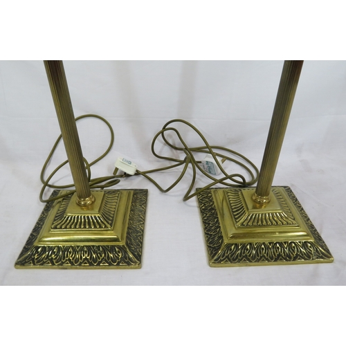 292 - Pair of brass standard electric lamps with reeded Corinthian columns & stepped bases