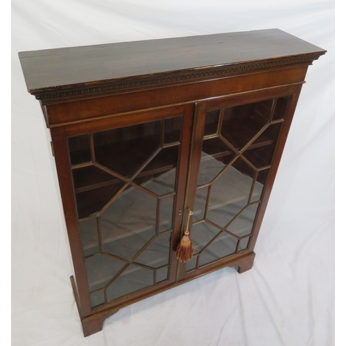 295 - Edwardian mahogany bookcase with astragal glazed doors, shelved interior, dentil frieze, on bracket ... 